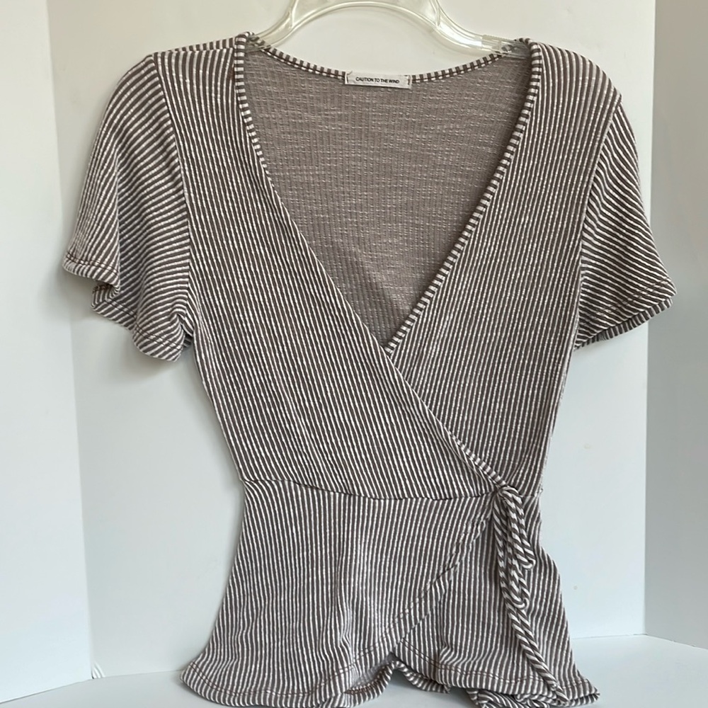 Caution to the wind, deep V neck, mock wrap, peplum striped knit top size small